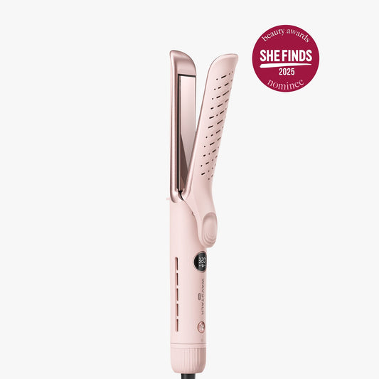 Pink Whirlwind Pro hair straightener with 'SHE FINDS' beauty awards badge on a white background