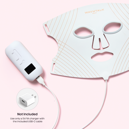 Glow Time LED therapy mask with USB cable and face mask on a pink background